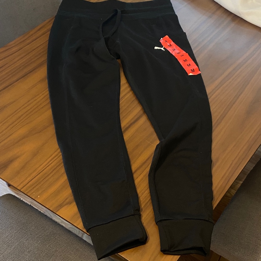 Puma Black Women's Joggers with White Logo and Red Accent